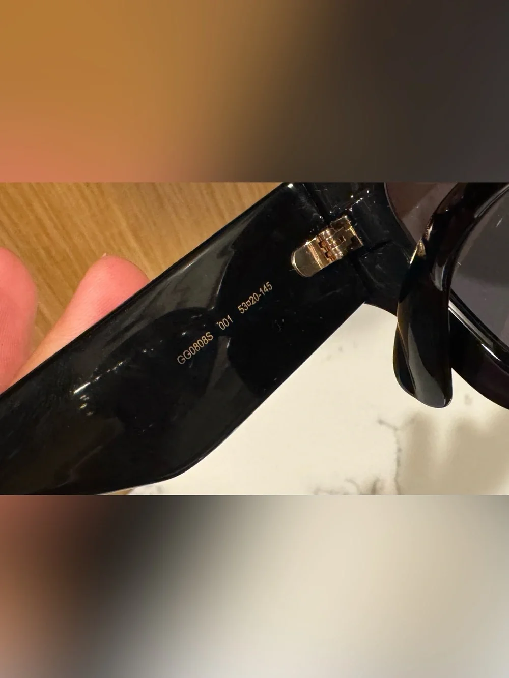 Gucci Black Women's Sunglasses with Gold GG Accents
